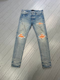 Amiri MX1 jeans light blue/ cracked orange